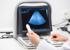 ultrasound-scanner-in-the-hands-of-a-doctor-diagnostical-sonography-clinic.jpg
